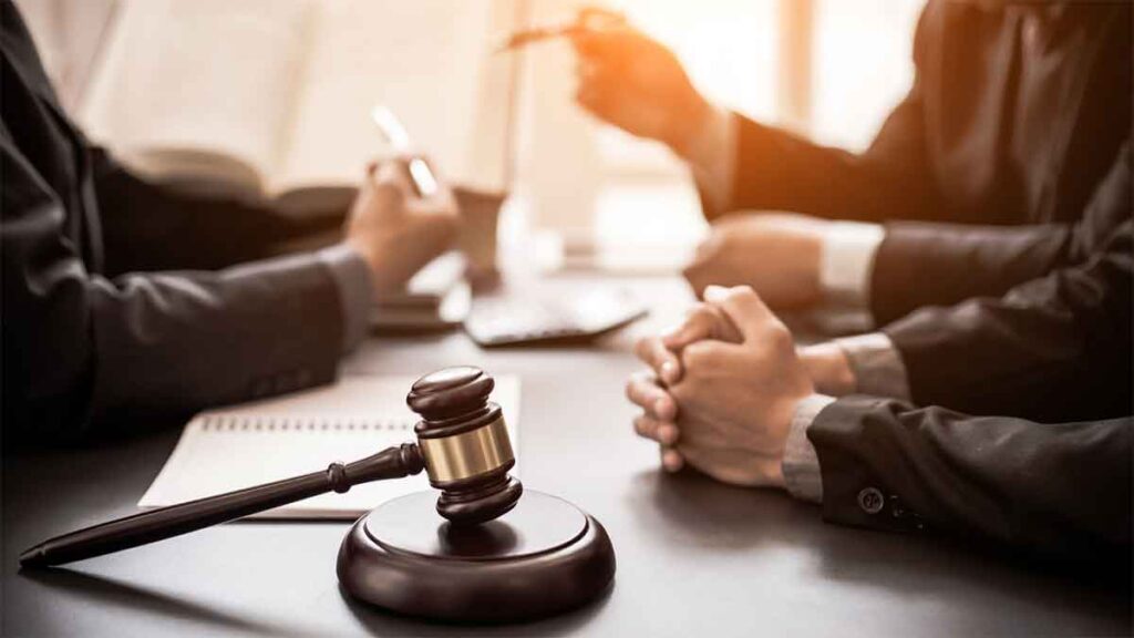A group of patent lawyers having disussions.