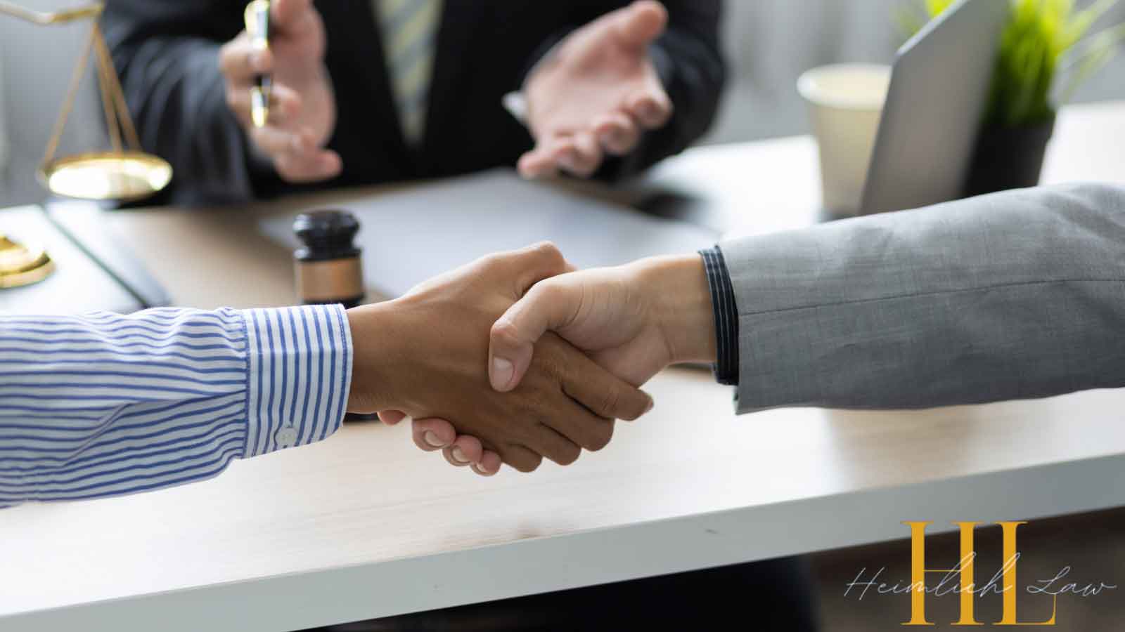 Businessmen shaking hands to finalize a deal.